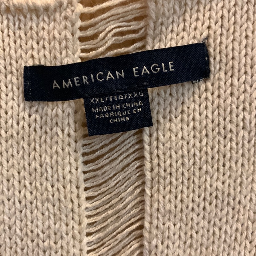Knit AE tank with custom pull design.